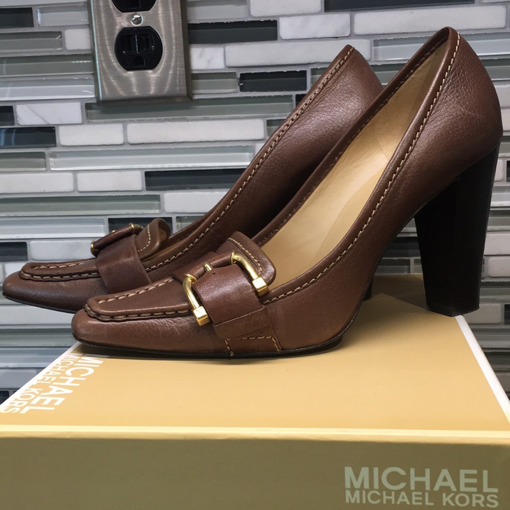 Michael Kors brown loafer heels.